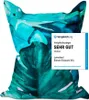 A large beanbag with a tropical leaf print, with a "Vergleich.org" rating badge overlaid. Voir les images du produit