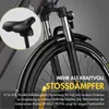Close-up of an electric bicycle's front fork, wheel, and saddle, with text highlighting features. Produktbild-Vorschau