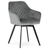 A gray velvet dining chair with black metal legs, shown from a three-quarter angle on a white background. Náhled obrázku produktu