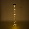A hanging string of lights with micro-LEDs. Voir les images du produit