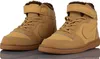 A pair of tan Nike Court Borough Mid Wtr Psv sneakers. Produktbild-Vorschau