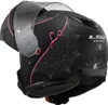 A black motorcycle helmet with pink and gray decorative patterns, shown from a side-diagonal view with the visor up. Náhled obrázku produktu