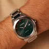 A close-up shot of a Citizen Eco-Drive watch on a person's wrist. Produktbild-Vorschau