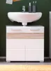 A bathroom vanity with a sink, faucet, and toiletries against a dark green wall. Anteprima dell’immagine prodotto