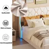 A bed with multiple pillows and a blanket, with informational icons on the left. Produktbild-Vorschau