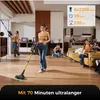 A woman is using a cordless vacuum cleaner in a modern living room, with other scenes of people using the vacuum in different parts of the house. Produktbild-Vorschau