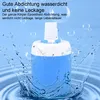 A portable camping shower with water splashing around it, against a blue background with bubbles. Produktbild-Vorschau
