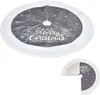 A round Christmas tree skirt with a white fluffy trim and a gray center featuring white snowflakes and the text "Merry Christmas" in a decorative font. A smaller, folded version of the skirt is shown in the bottom right corner. Produktbild-Vorschau