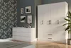 A bedroom scene featuring a white dresser and a white wardrobe. Anteprima dell’immagine prodotto