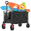 A black folding wagon filled with beach items like surfboards, a beach ball, and an inflatable ring. Produktbild-Vorschau