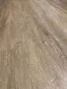 A close-up shot of vinyl flooring planks. Produktbild-Vorschau
