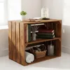 A wooden crate shelf unit with various decorative items. Náhled obrázku produktu