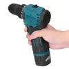 A hand holding a cordless drill. Náhled obrázku produktu