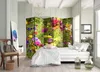 A bedroom with a bed, a folding screen with a floral print, and a chair. Produktbild-Vorschau