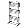 A black metal drying rack with multiple tiers and wheels, shown against a white background. Produktbild-Vorschau