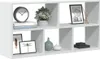 A white cube shelf unit filled with decorative items. Voir les images du produit