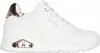A white SKECHERS UNO WEDGE-HI STEPS sneaker with rose gold accents is shown from the side against a white background. Voir les images du produit