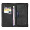 An open black wallet case with cards and banknotes inside. Produktbild-Vorschau