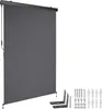 A dark gray roller blind is shown, mounted on a dark gray bar. Below the blind, to the right, are mounting brackets and hardware. Náhled obrázku produktu