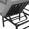 Close-up view of the metal frame and gray fabric of a sofa. Produktbild-Vorschau