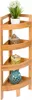 A four-tier bamboo corner shelf unit with decorative items on each shelf. Podgląd zdjęcia produktu