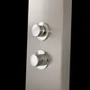 A close-up view of two chrome shower knobs on a brushed metal shower panel. Podgląd zdjęcia produktu