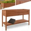 A wooden raised garden bed with a shelf underneath. Produktbild-Vorschau