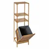 A tall, narrow bamboo shelving unit with three shelves and a built-in laundry basket. Produktbild-Vorschau