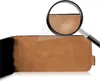 A close-up view of the interior of a brown leather flip case for a phone, with a magnifying glass highlighting the stitching. Produktbild-Vorschau
