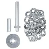 A set of metal eyelets and tools for their application, laid out on a white background. Produktbild-Vorschau