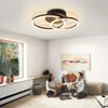 A couple sits on the floor in a modern living room, playing a board game. The room features a large window, a sofa, and a contemporary ceiling light. Anteprima dell’immagine prodotto
