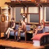 A diorama of a train compartment with three figures sitting on a bench, waiting. Voir les images du produit