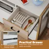 A close-up view of an open drawer in a cabinet, showcasing cutlery and a plate. The image also includes text overlays highlighting product features. Podgląd zdjęcia produktu