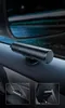 A black safety hammer with a seatbelt cutter is mounted on the interior of a car door. Náhľad obrázku produktu