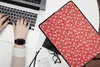MuchoWow® Laptop Hülle 14 ZollEin rotes und weißes Produktbild-Vorschau 2