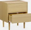 A wooden nightstand with two drawers, one of which is partially open, shown against a white background. Anteprima dell’immagine prodotto