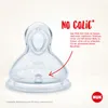 A close-up of a NUK anti-colic baby bottle nipple with marketing text and a red arrow pointing to a feature. Produktbild-Vorschau