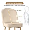 A close-up of a beige upholstered chair with text overlays highlighting its ergonomic design features, alongside a diagram of the human spine. Náhľad obrázku produktu