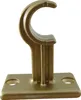A single brass curtain rod bracket on a white background. Produktbild-Vorschau
