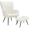 A cream-colored armchair and matching ottoman with black legs, presented on a white background. Náhled obrázku produktu