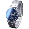 A close-up studio shot of a men's wristwatch with a blue dial and silver metal band, against a white background. Produktbild-Vorschau