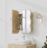 A bathroom vanity with an open medicine cabinet above a sink. Podgląd zdjęcia produktu