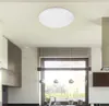 A modern kitchen with a ceiling light fixture above a window. Náhľad obrázku produktu