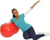 A woman is posing with a red peanut ball. Produktbild-Vorschau