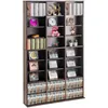 A dark brown, multi-shelf media storage unit filled with CDs, DVDs, and decorative items. Podgląd zdjęcia produktu