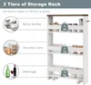 A white storage rack with three tiers, showcasing different items that can be stored on each tier. Náhľad obrázku produktu