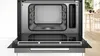 Close-up interior view of an open oven. Anteprima dell’immagine prodotto