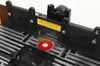 Close-up view of a router table fence with a red insert and a clear plastic guard. Anteprima dell’immagine prodotto