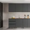 A modern kitchen scene featuring dark gray cabinets and a light wood countertop. Náhľad obrázku produktu