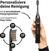 A hand holding a black electric toothbrush with text and diagrams explaining its features. Produktbild-Vorschau